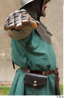  Photos Medieval Guard in mail armor 4 Medieval clothing Medieval guard chainmail hood green gambeson leather bag leather belt upper body 0003.jpg